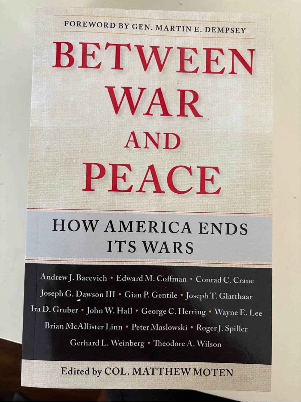 Between War and Peace by Col. Matthew Moten — Red and Cream Cover